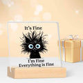 It's fine frazzled black cat acrylic desk plaque with wooden stand