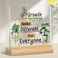 Growth Looks Different For Everyone plant acrylic desk plaque with wooden stand